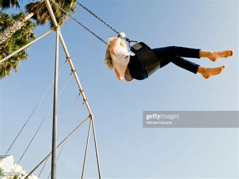 Girl Swing Sky Photo Getty Images
