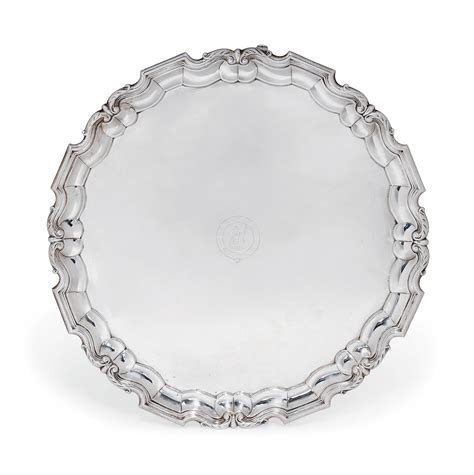 A SILVER SALVER IN THE GEORGIAN STYLE , MARK OF PERCY EDWARDS LTD., LONDON, 1913 | Christie's
