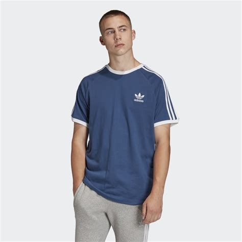 İkonik 3 bantlı tişört, ilk kez tanıtıldığı 1973 yılında, kısa bir süre içinde popüler hale geldi. adidas 3-Stripes T-Shirt - Blue | adidas UK