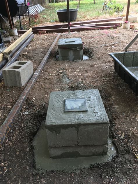Cinder Block Piers Are Done Filled With Cement And Reinforced With