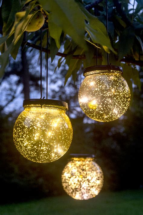 Hanging hook and chain included. Solar Globe Lights Fairy Dust Ball | Gardeners.com
