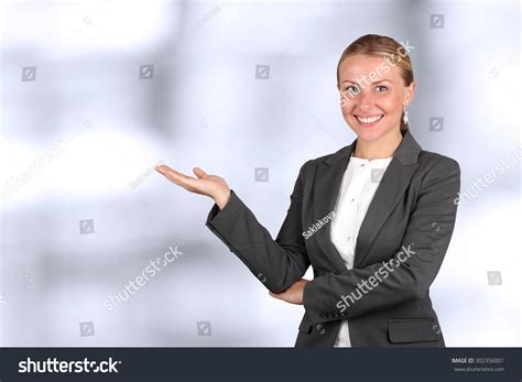 Smiling Business Woman Presenting Presentations Stock Photo 302356001