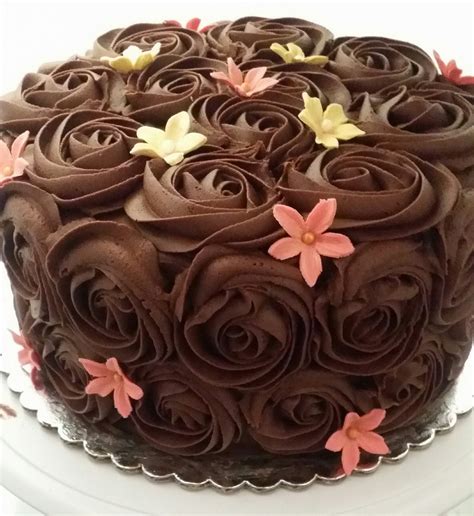 Now pour in some melted white chocolate and fill in the heart shape. Chocolate buttercream rose swirl, fondant flower decorations | Buttercream wedding cake, Cake ...