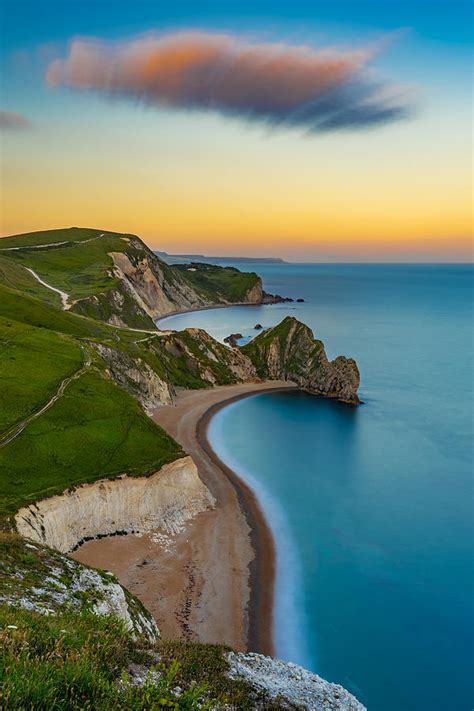 Sunset At Durdle Door In England Photograph By George Afostovremea Pixels