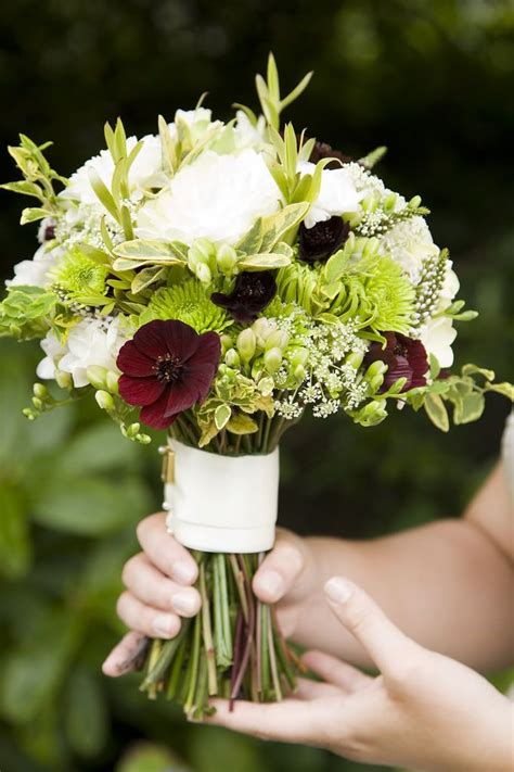 Brown and white wedding bouquet with white roses, pinecones and cotton. Gorgeous bouquet | Green wedding bouquet, Bridal bouquet ...