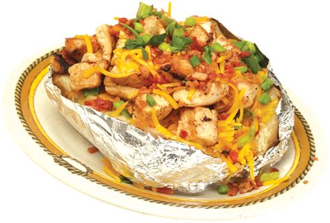 Creamy baked sweet potatoes get a dinner upgrade by mixing in roasted veggies, chicken, and cheese, and then topping them with avocado. Spuds - 9er's Grill