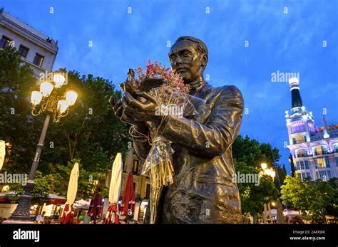 Statue Of Federico Garcia Lorca In The Plaza De Santa Ana At Night