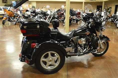 Belt * factory security * adjustable rider backrest * highway pegs * passenger grab rails * heat shields. Harley Davidson Electra Glide Ultra Classic Trike ...