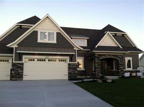 The use of the stained finished can be applied your paint schemes for you house exterior. Gray exterior stone color scheme | Exterior paint colors ...