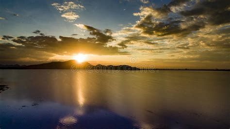 Beautiful Scenic Of Sun Set Sky At Bangpra Reservoir Lake In Chonburi