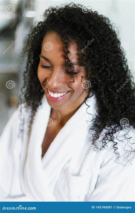 Close Up Photo Of Pretty Afro American Girl Standing In Bathroom And