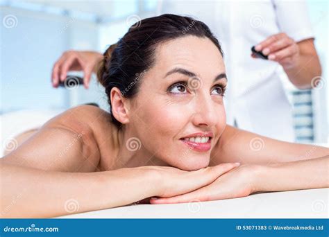 Smiling Brunette Getting Hot Stone Massage Stock Image Image Of Pampering Background