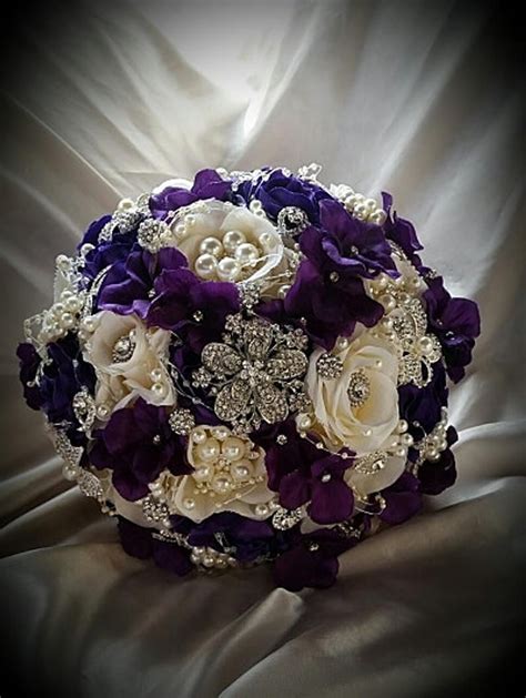 An order of wedding bouquets purple and silver usually includes not only a small bouquet of a bride, but also a boutonniere from the same collection the transport, that delivers you wedding bouquets purple and silver is equipped with a device for creating comfortable for flowers microclimate. Purple and Ivory JEWELED Bouquet, Purple Ivory and Silver ...