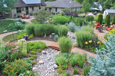 Plants, stone, shallow swales and depressions that catch and hold rainwater rather than let it run off unhindered. 18 Beautiful Landscape Designs With Rocks & Stones