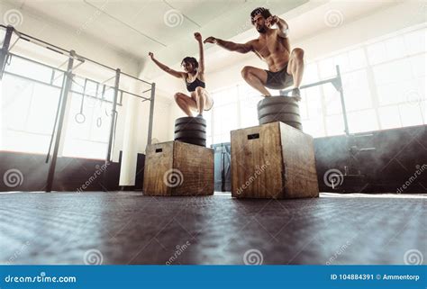Fitness Couple Doing A Box Squat At The Gym Stock Image Image Of