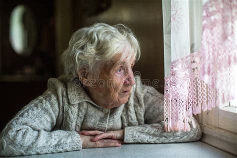 364 Lonely Old Woman Looking Out Window Stock Photos Free And Royalty