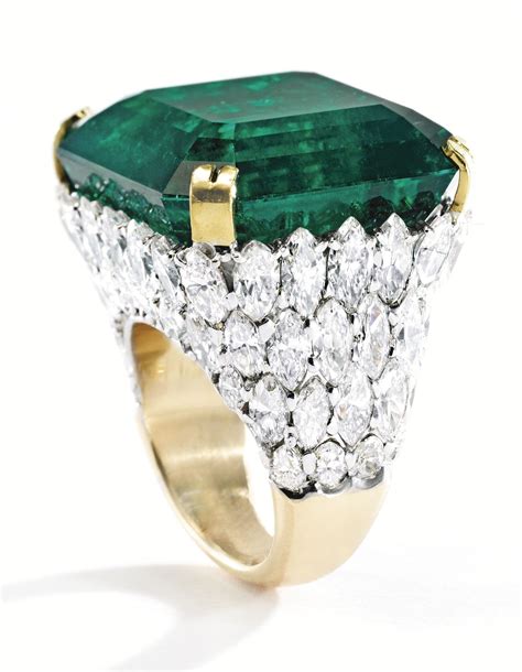 Magnificent Platinum 18 Karat Gold Emerald And Diamond Ring Centering