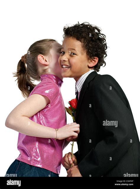 Cute Little Girl Kissing A Boy Stock Photo Alamy