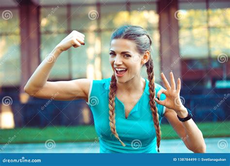 Smiling Woman Showing Bicep Stock Image Image Of Physical Exterior