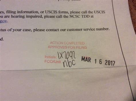 On Form I-485 written in red ink Action completed, approved for filing