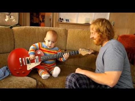 Baby Playing Guitar 9buz