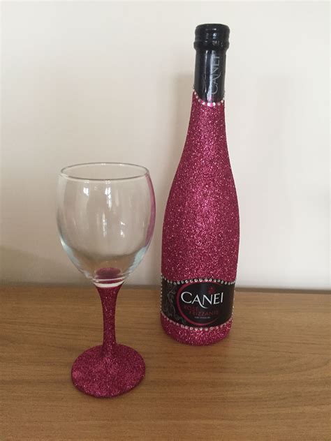 Paint on an even coat of glitter glue onto the wine bottle 3. Pink glitter bottle and glass - mod podge | Glitter wine bottles, Glitter bottle, Glitter glass