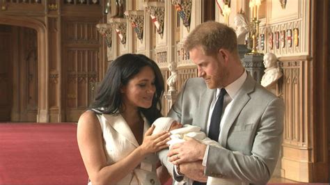 Pa:press a second colour photo shows the new parents posing with the little boy's grandparents prince charles another suggested archie has a head like meg and harry's eyes. Royal baby name revealed: Prince Harry and Meghan name son ...
