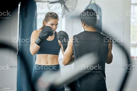 Boxing Fitness Training With Coach At Gym Angry Woman Learning Self