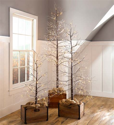 Our Indooroutdoor Snowy Lighted Tree Has A Natural Shape And Style
