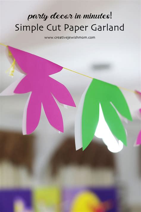 how to cut simple floral shapes from paper to make a party garland in minutes creative jewish mom