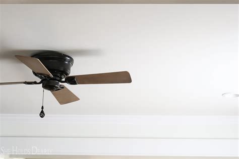 Mounting a 60 industrial ceiling fan which extends 18 from ceiling to blade with a 4:12 pitch will only give you a 10 clearance. DIY Industrial Ceiling Fan - She Holds Dearly