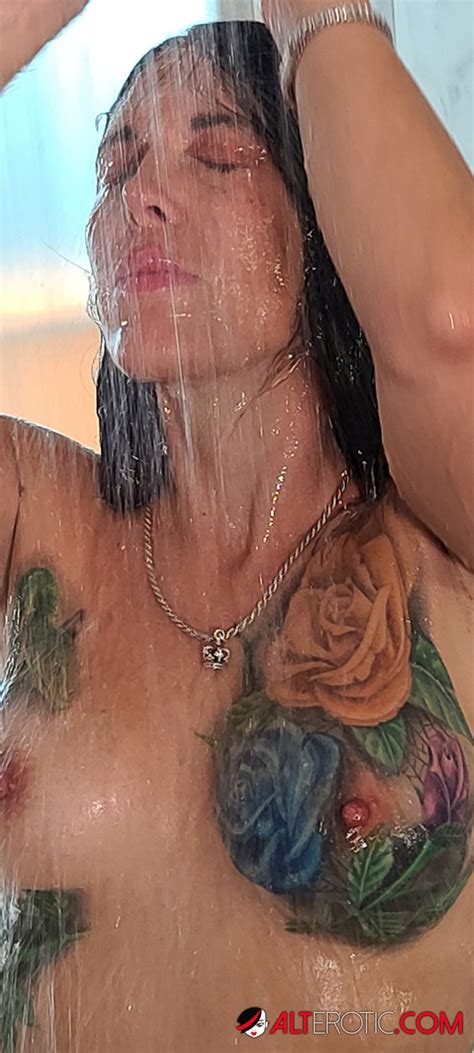 Tatted Older Woman Marie Bossette Highlights Her Pierced Pussy While Showering NakedPics