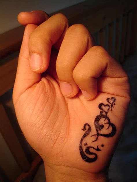 30 Hand Tattoo Designs For Boys And Girls