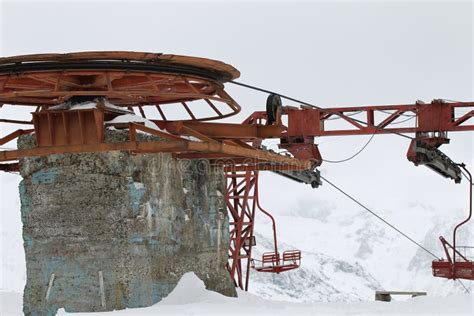 Drive Wheel Of A Homemade Ski Lift With Teenage Skiers Stock Photo