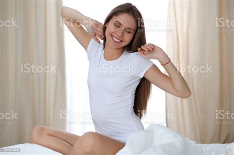 Woman Stretching In Bed After Wake Up Entering A Day Happy And Stock Image Everypixel