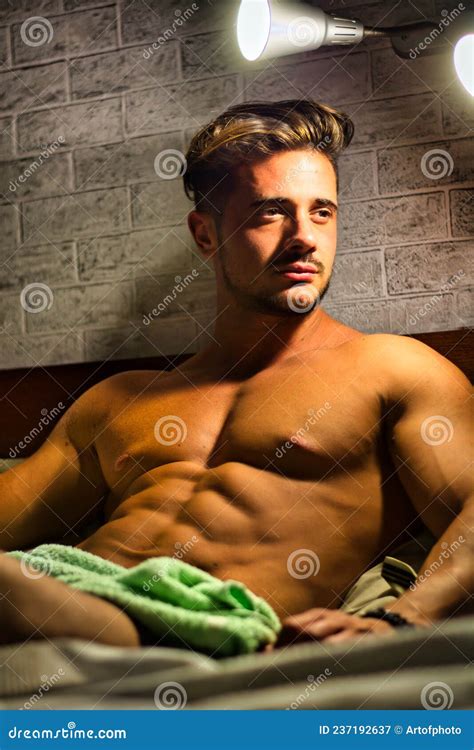 Shirtless Male Model Lying Alone On His Bed Stock Image Image Of Bedroom Blinds 237192637