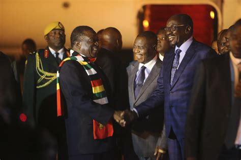Zimbabwes President Returns Amid Economic Crisis Crackdown