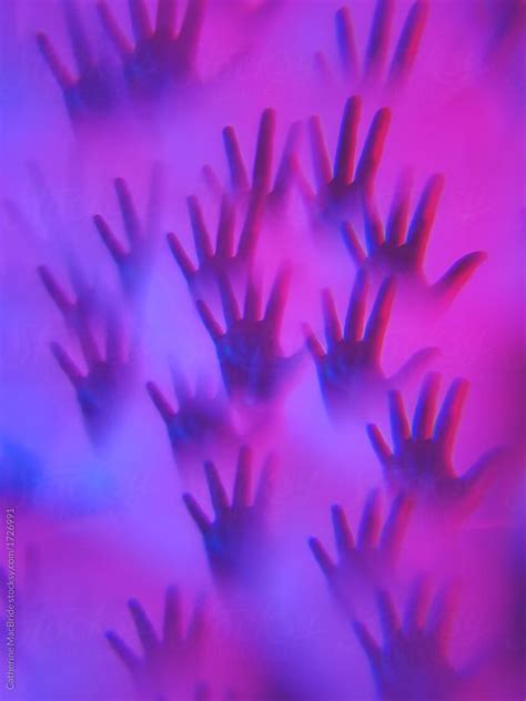Raised Hands By Catherine Macbride For Stocksy United Ultraviolet