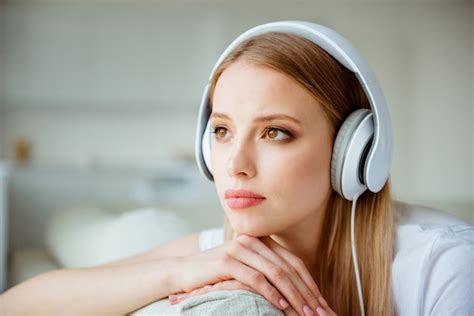 Premium Photo Portrait Woman At Home Listening Music