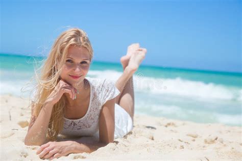 Smiling Young Girl Lying On The Sunny Beach Stock Image Image Of Girl