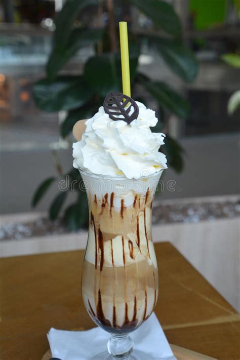 Delicious Iced Coffee With Whipped Cream On A Glass Cup Stock Image