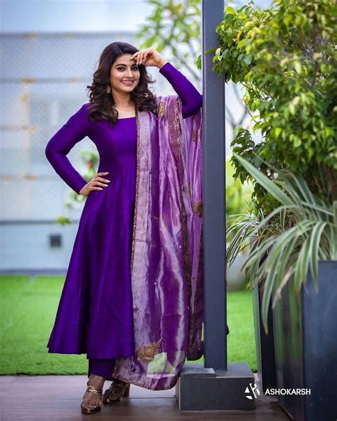 sneha prasanna s pleasant look in a violet anarkali with embroidered dupatta long gown design