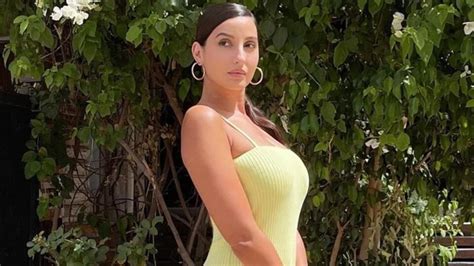 Nora Fatehi Pairs Sexy Neon Yellow Bodycon Dress With ₹3 Lakh Bag For