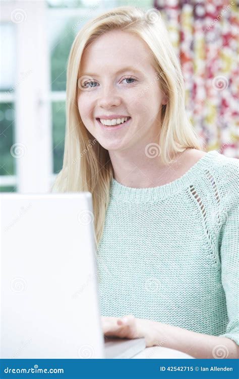 Smiling Teenage Girl Using Laptop At Home Stock Image Image Of Happy