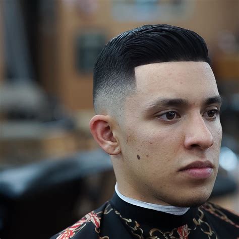 With less room for a taper fade, the sharp high fade transition from short sides to the longer top is daring. 27+ Fade Haircut Styles For 2021 -> Every Type Of Fade You ...