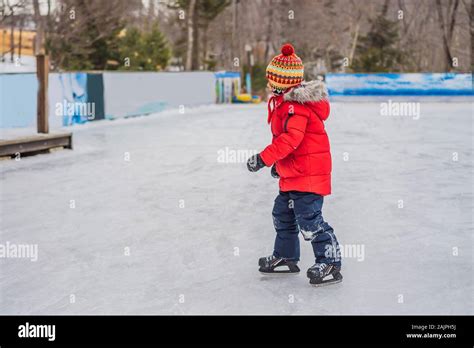 Boy Ice Skating For The First Time Stock Photo Alamy