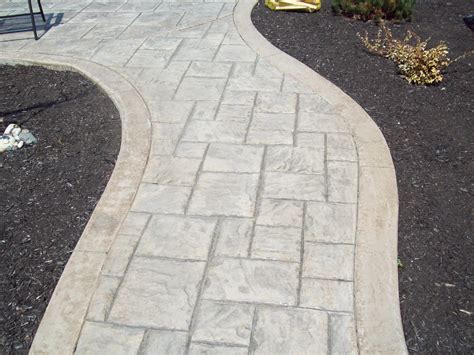 If you'd like to be able to tell us which photo(s) you like, just hover over the image with your mouse (longpress the photo on a touchscreen) and the photo's title will appear (for example: Concrete Concepts | Stamped concrete walkway, Stamped ...