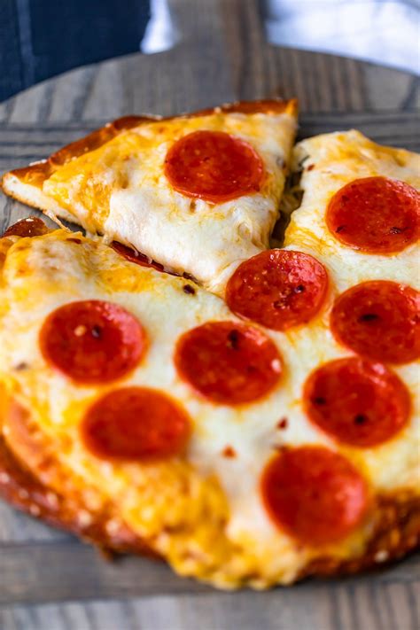 Place warm water into a measuring cup and stir in sugar to dissolve. Soft Pretzel Crust Pizza with Cheese Sauce is the ULTIMATE ...