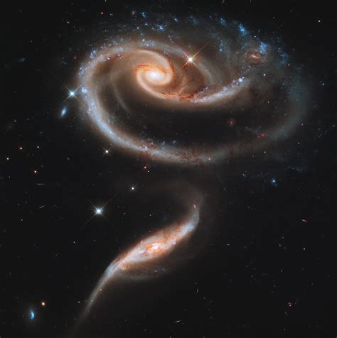 Nasas Hubble Telescope Shows Space Rose Of 2 Galaxies