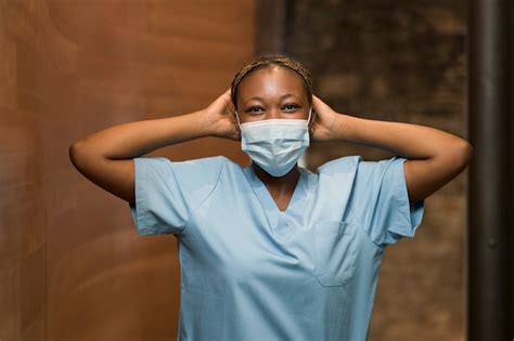 Free Photo Nurse Wearing Scrubs While Working At The Clinic